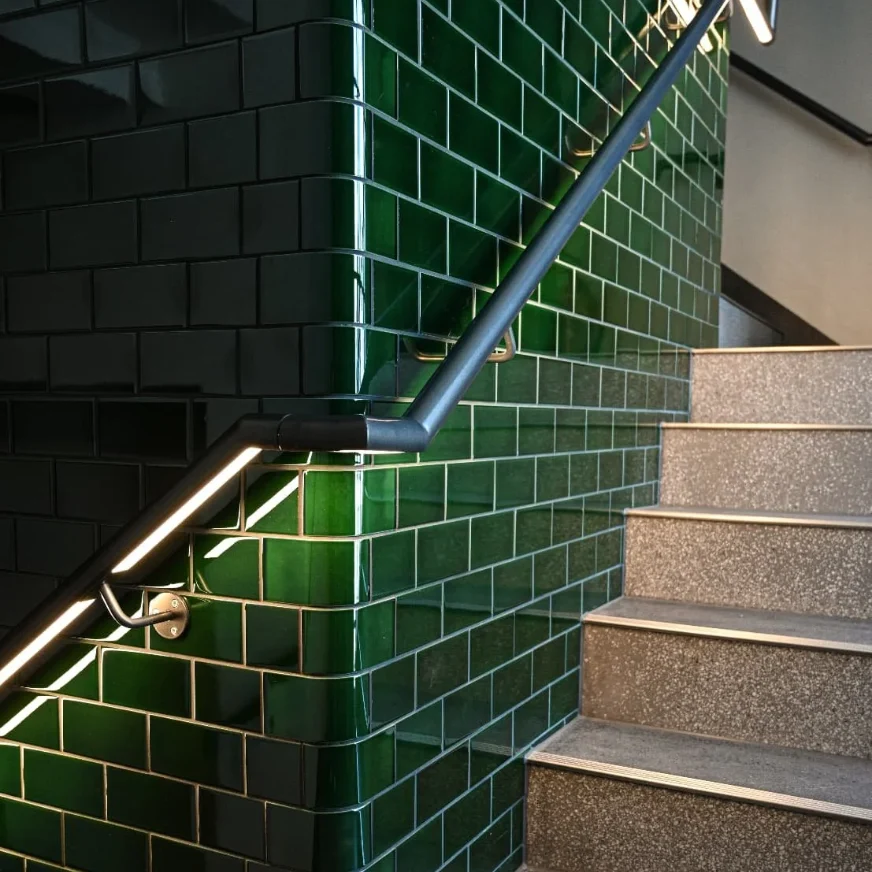 Green-tiled staircase at Shropshire House
